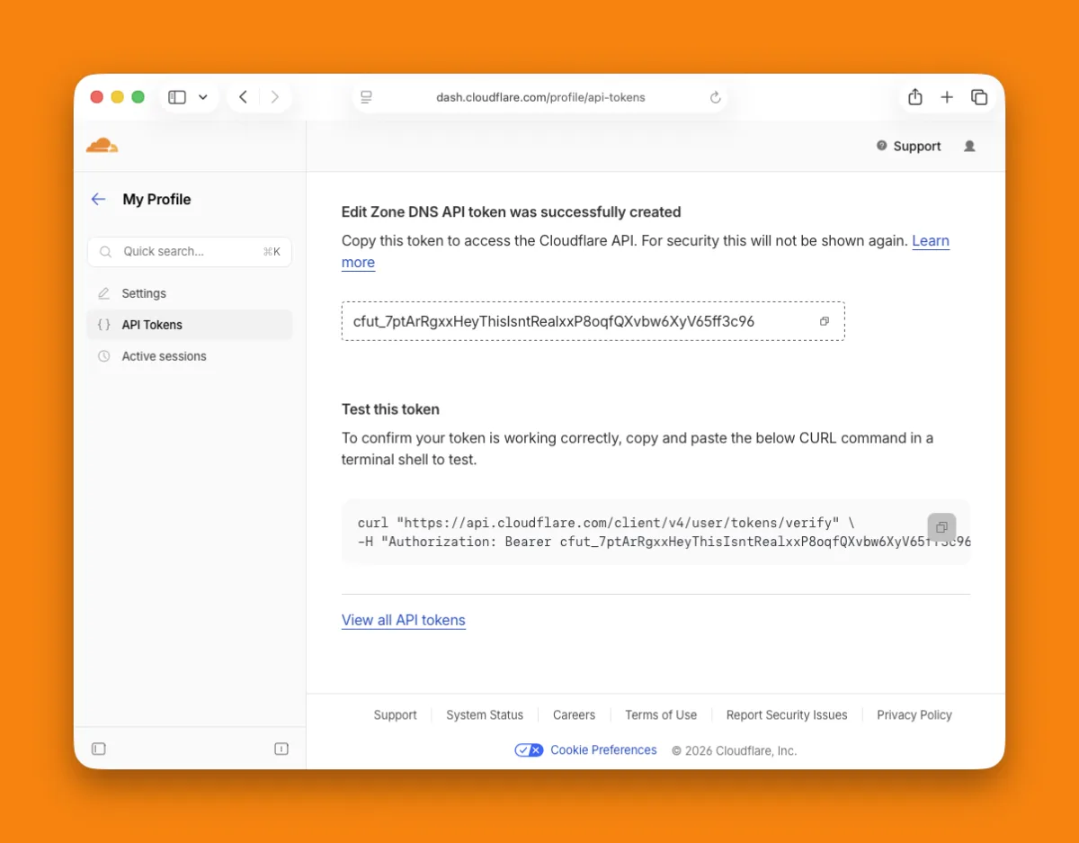 Cloudflare's confirmation page showing the new API token and a curl command to test it